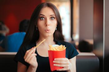 Why Lamb Weston Stock Tanked Today: https://g.foolcdn.com/editorial/images/784424/woman-holds-french-fries-while-making-expressive-face.jpg