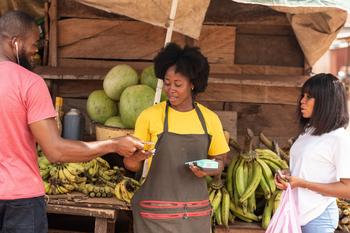 3 Reasons to Buy This Top Growth Stock: https://g.foolcdn.com/editorial/images/747980/people-buying-bananas-at-a-fruit-stall.jpg