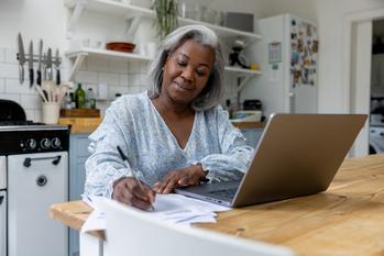 Medicare Open Enrollment Has Arrived. Here Are 4 Things to Do Between Now and Dec. 7.: https://g.foolcdn.com/editorial/images/750018/older-woman-laptop-taking-notes-gettyimages-1432413376.jpg