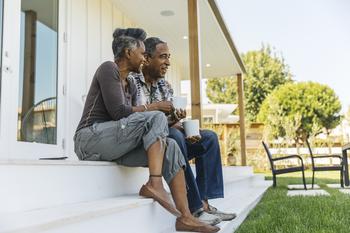 1 Top ETF to Buy Now and Hold Forever: https://g.foolcdn.com/editorial/images/716741/smiling-couple-sitting-on-a-porch.jpg