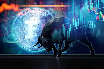 This Crypto Stock Has More Than Doubled Bitcoin's Gains This Year: https://g.foolcdn.com/editorial/images/780717/a-bull-in-front-of-a-bitcoin.jpg