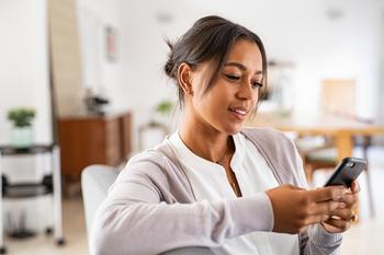 Why iRobot Stock Was a Winner on Wednesday: https://g.foolcdn.com/editorial/images/786360/person-looking-pleased-while-gazing-at-a-smartphone.jpg