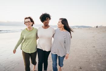 Social Security: The Average Retiree Could Collect $740 More per Month With This Simple Move: https://g.foolcdn.com/editorial/images/782062/three-people-walking-on-the-beach-and-smiling.jpg