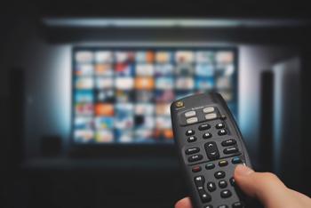 You Don't Have to Pick a Winner in Streaming. Here's Why.: https://g.foolcdn.com/editorial/images/735346/right-hand-remote-pointed-at-tv.jpg