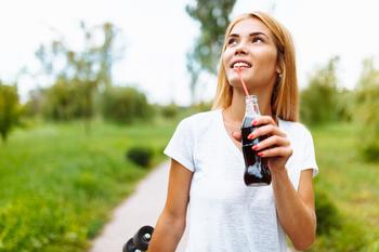 1 Blue Chip Dividend Stock Near a 52-Week Low to Buy Hand Over Fist: https://g.foolcdn.com/editorial/images/750095/drinking_soda_in_the_park-gettyimages-1015978442.jpg