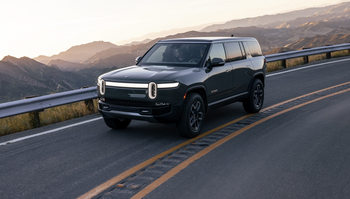 Why Rivian Stock Dropped Again Today: https://g.foolcdn.com/editorial/images/752404/rivian-r1s-on-scenic-road.png