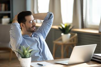 3 Low-Risk Dividend Stocks to Buy in 2023: https://g.foolcdn.com/editorial/images/717434/man-with-arms-behind-head-looking-at-laptop.jpg