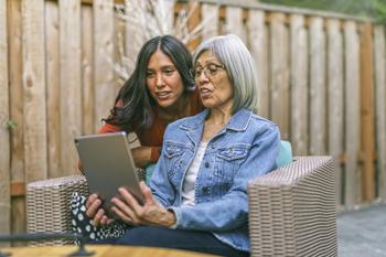 Bull Market Buys: 2 Nasdaq Stocks to Own for the Long Run: https://g.foolcdn.com/editorial/images/782021/senior-woman-learning-to-use-tablet-computer-with-the-help-of-her-adult-daughter.jpg