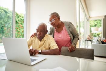 Don't Wait Until Retirement to Make Lifestyle Changes if You Know They'll Be Necessary: https://g.foolcdn.com/editorial/images/743255/senior-couple-at-laptop-gettyimages-1178603331.jpg