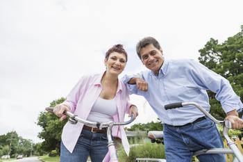 Want the Max $4,873 Social Security Monthly Benefit? 2 Things to Do Before Retirement.: https://g.foolcdn.com/editorial/images/770445/active-retirement-ride-bike-happy-couple.jpg