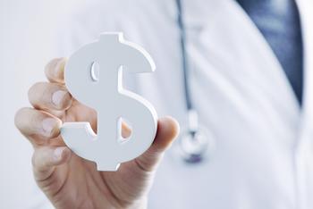 Why Ironwood Pharmaceuticals Stock Bumped Higher Today: https://g.foolcdn.com/editorial/images/733525/medical-professional-holding-dollar-sign-paperweight.jpg