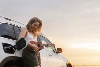Why Shares of Lucid Are Driving Higher Today: https://g.foolcdn.com/editorial/images/738438/a-driver-plays-a-ukelele-while-charging-an-electric-car.jpg