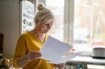 Got $157,500 to Spend on Healthcare in Retirement? If Not, Then Do This.: https://g.foolcdn.com/editorial/images/771205/senior-woman-documents-gettyimages-1446916058.jpg