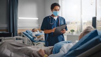 2 Healthcare Stocks to Buy Hand Over Fist This Month: https://g.foolcdn.com/editorial/images/782612/doctor-and-patient-in-a-hospital-room.jpg