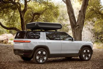 Why Rivian Stock Is Higher Today: https://g.foolcdn.com/editorial/images/768950/rivian-r2-reveal-photo.jpeg