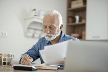 Retiring on Social Security Alone in 2024? Here's What That Might Look Like.: https://g.foolcdn.com/editorial/images/760759/older-man-at-desk-serious-gettyimages-1367292739.jpg