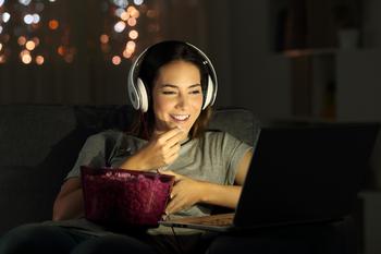 Will Netflix Be Worth More Than Meta Platforms by 2025?: https://g.foolcdn.com/editorial/images/762620/woman-video-laptop.jpg