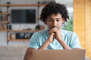 Shopify, Fiserv, and Adyen Just Partnered With This Beaten-Down Financial Stock. Is This Good for Investors?: https://g.foolcdn.com/editorial/images/790203/young-man-sitting-pensively-at-his-computer-looking-thoughtfully-at-the-screen-in-front-of-him.jpg