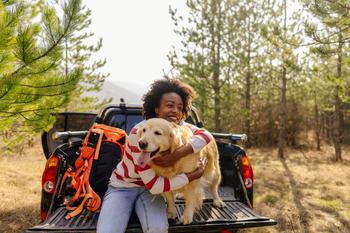 Why Rivian's Stock Is Powering Higher Today: https://g.foolcdn.com/editorial/images/734178/a-dog-and-its-owner-in-the-back-of-a-pickup-truck.jpg