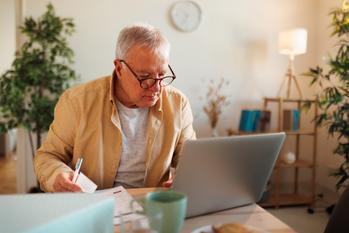 3 Signs It's Time to Change Your Medicare Part D Plan: https://g.foolcdn.com/editorial/images/750790/older-man-laptop-gettyimages-1463756689.jpg