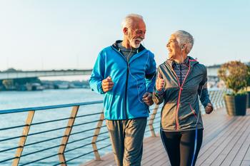 Does Retiring Abroad Impact My Social Security?: https://g.foolcdn.com/editorial/images/744130/retired-couple-seniors-outside-exercising-happy-smiling.jpg